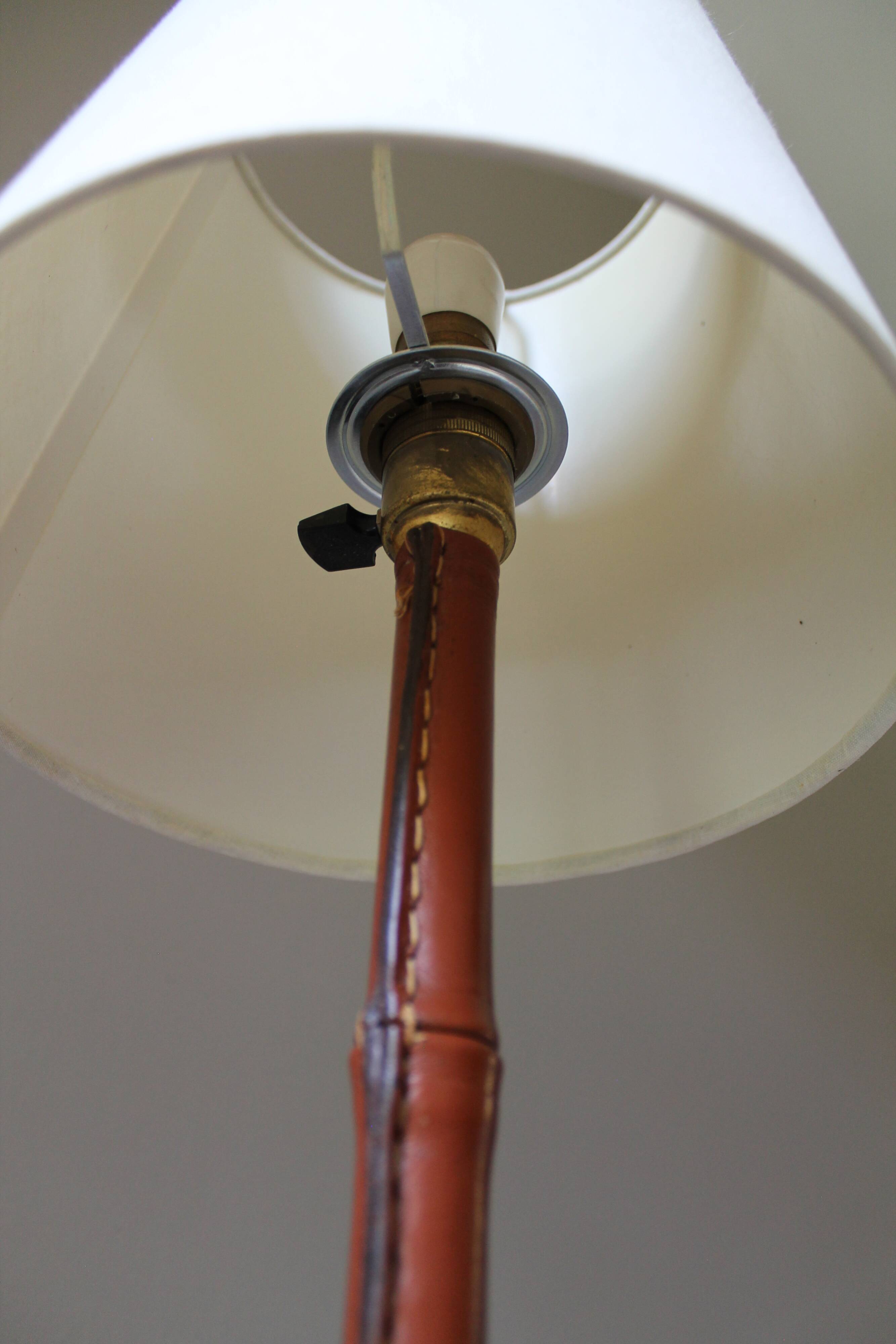 Vintage floor lamp with bamboo-style leather base