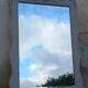 Antique Louis XV style mirror in solid oak with grey patina, 131cm.