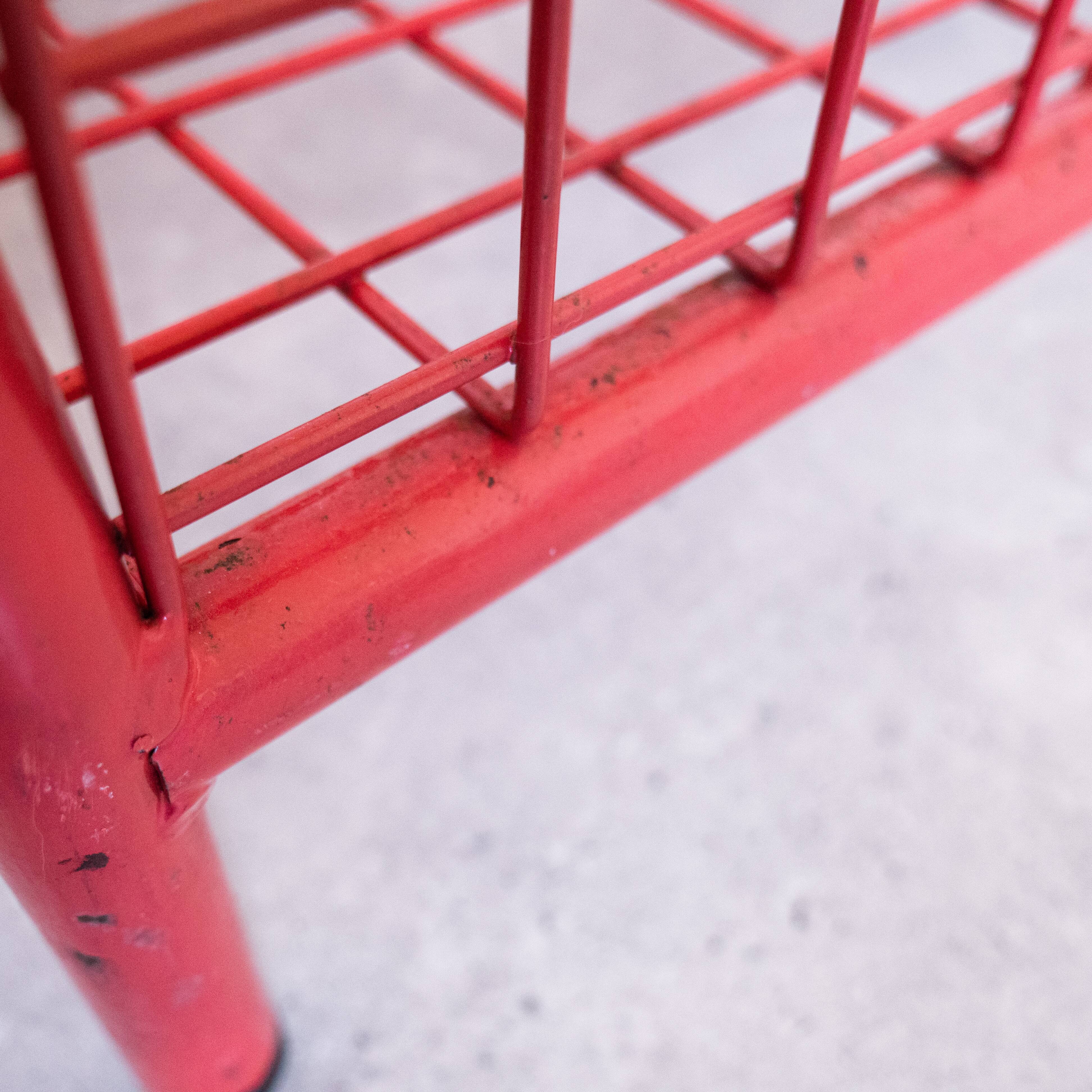 Red mesh metal grocery shelf