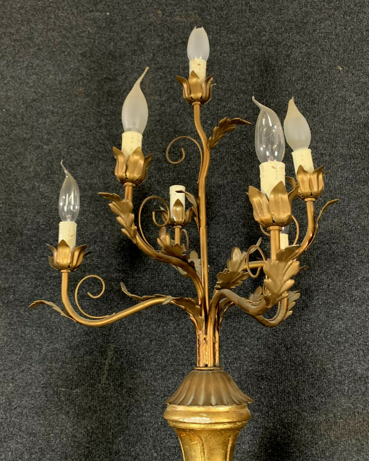 Early XXth era polychrome wooden torch has figuration of a Moor in traditional costume from the 18th