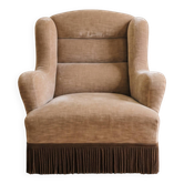 Vintage 1970s armchair in beige fabric with fringes.