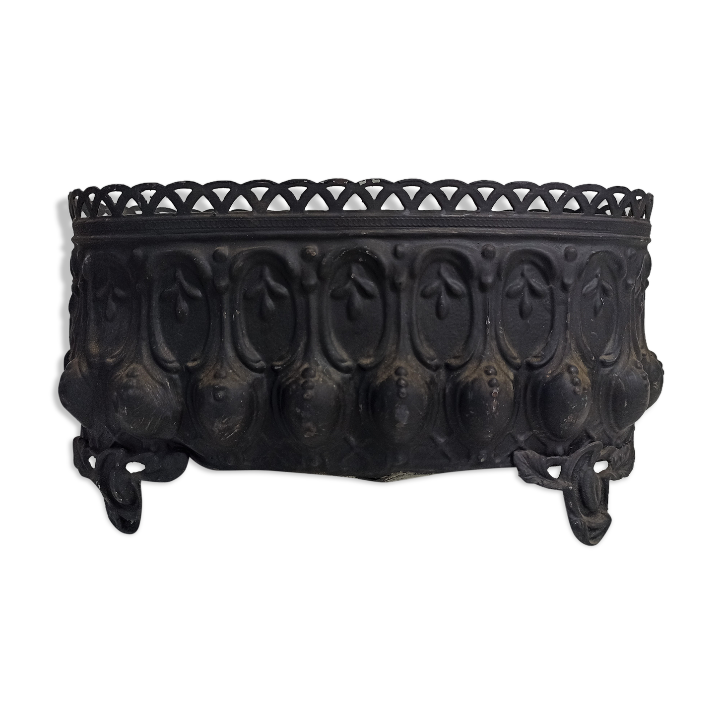 Old black iron planter