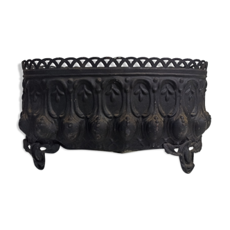 Old black iron planter