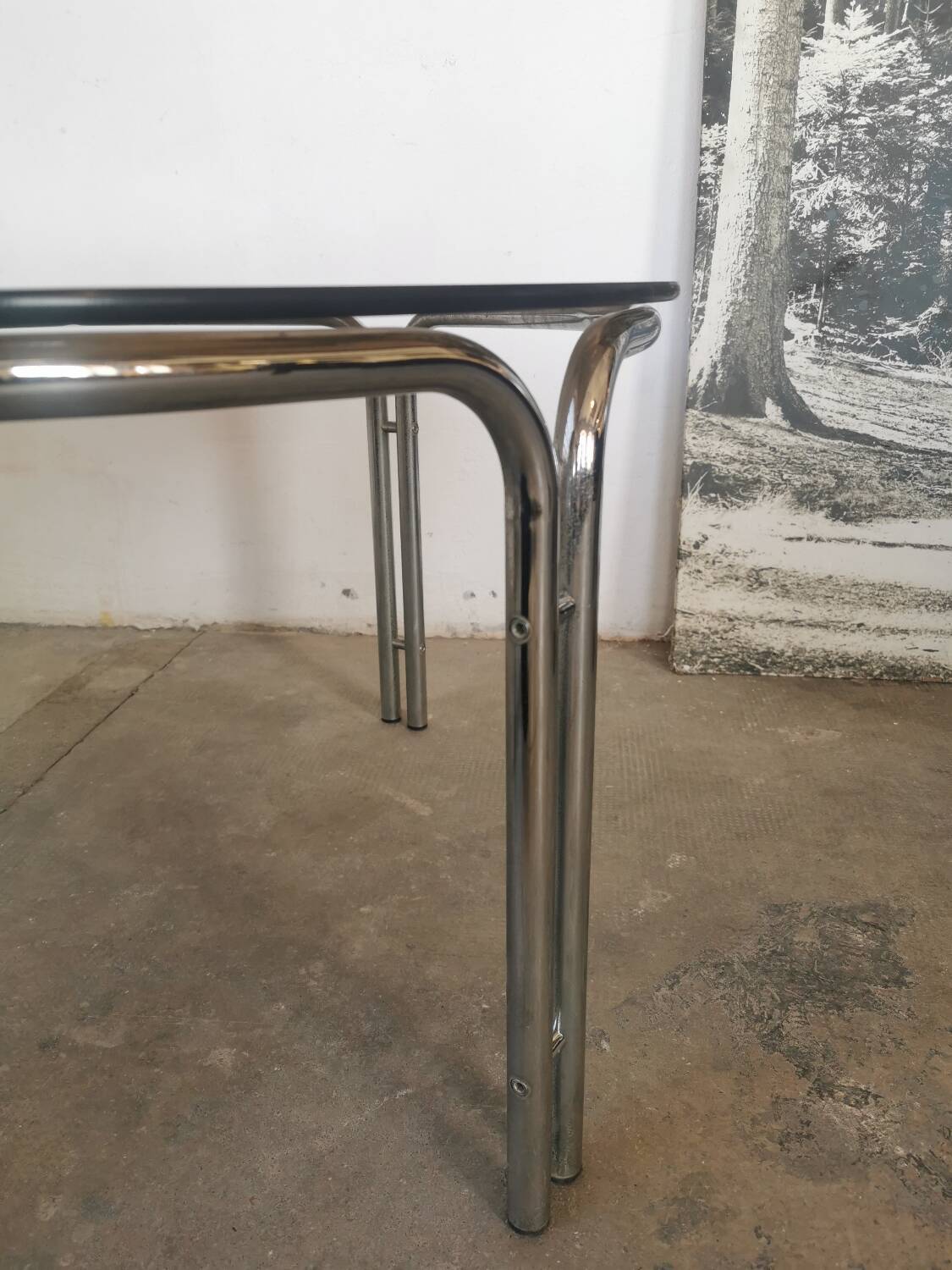 Round chrome and smoked glass coffee table