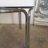 Round chrome and smoked glass coffee table