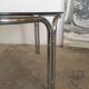 Round chrome and smoked glass coffee table