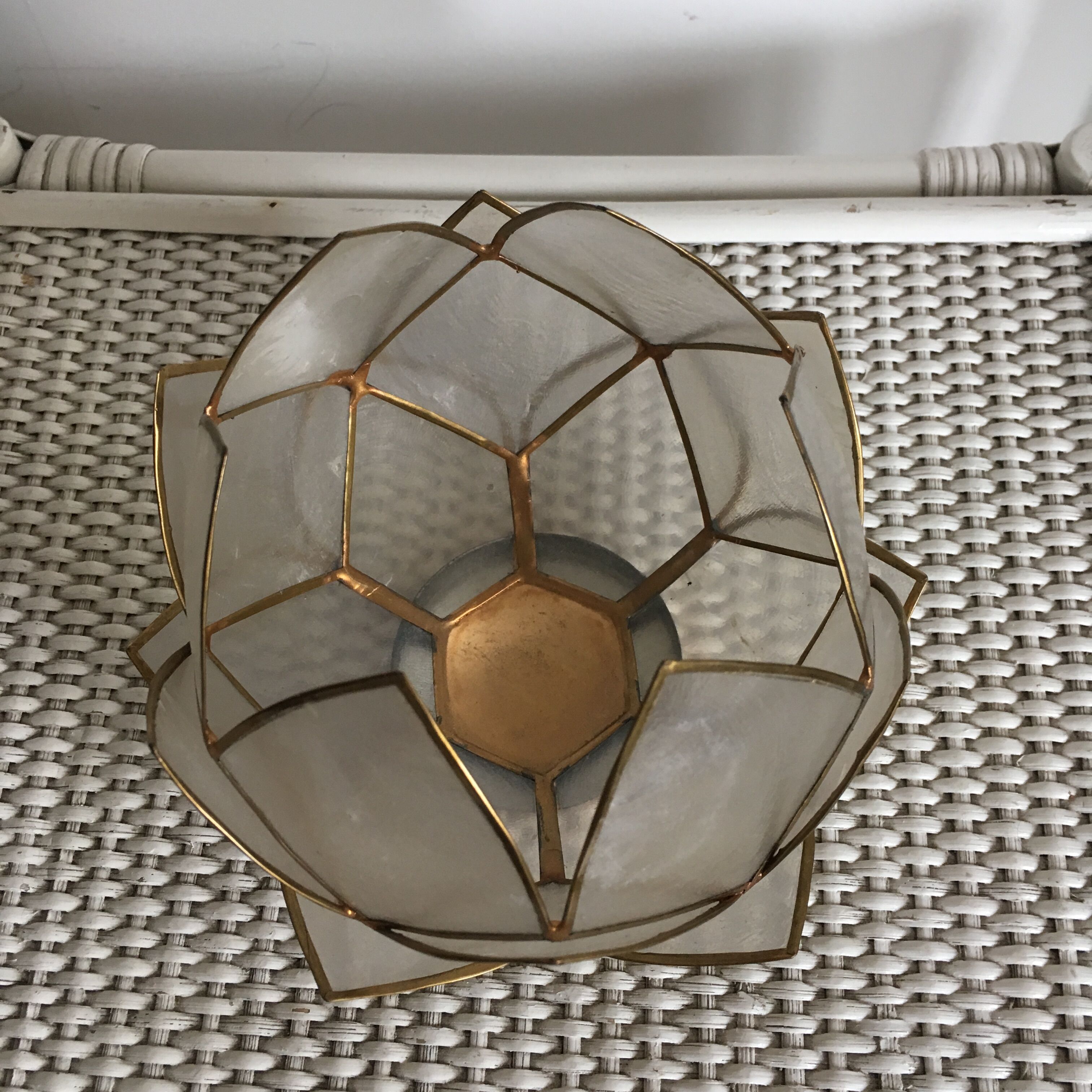 Candlestick or candle holder in nacre flower shape