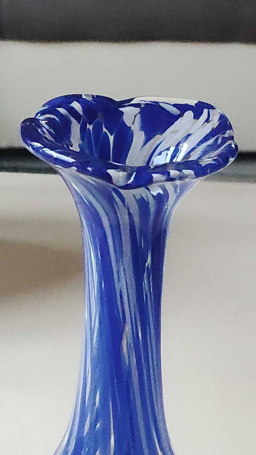 Murano style floral vase. Corolla neck, speckled cobalt blue & white. Dim 24 x 10 cm