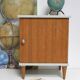Bedside table with 1 door and 1 internal drawer.