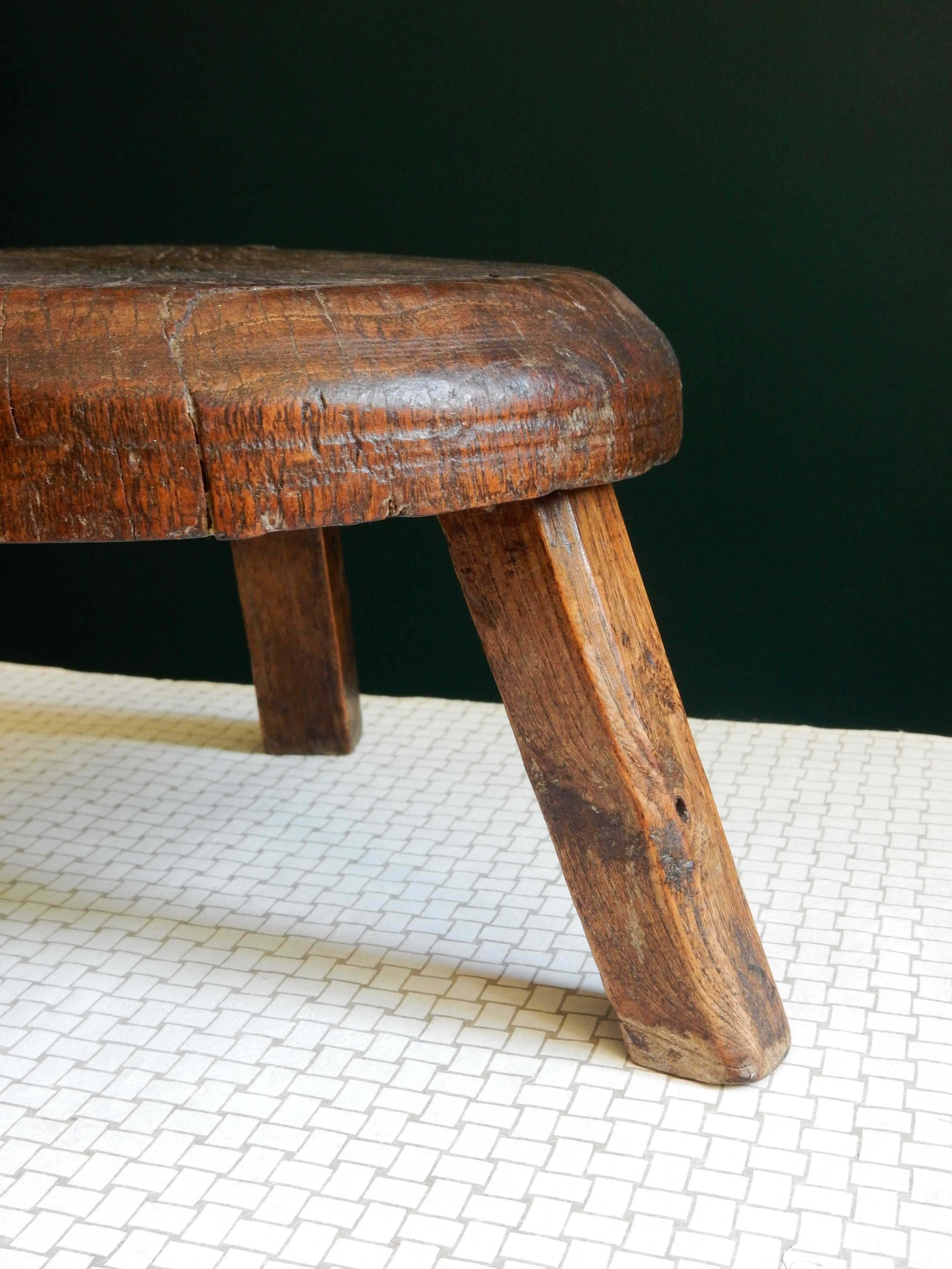 Small wooden farm tripod stool