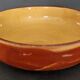 Glazed terracotta shallow dish from the 20th century.