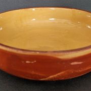 Plat creux terre cuite vernissée XXème