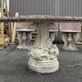 Pretty round table in reconstituted stone