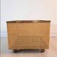 Meuble de rangement vintage à roulettes en lucite, paille de vienne et laiton