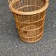 Round wicker and rattan basket with handle
