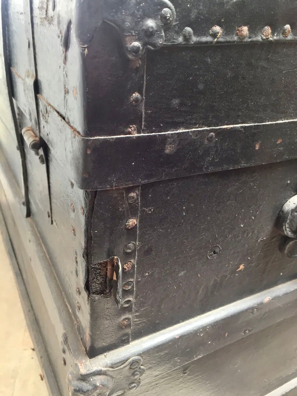 Black ancient travel trunk, 19th