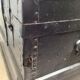 Black ancient travel trunk, 19th