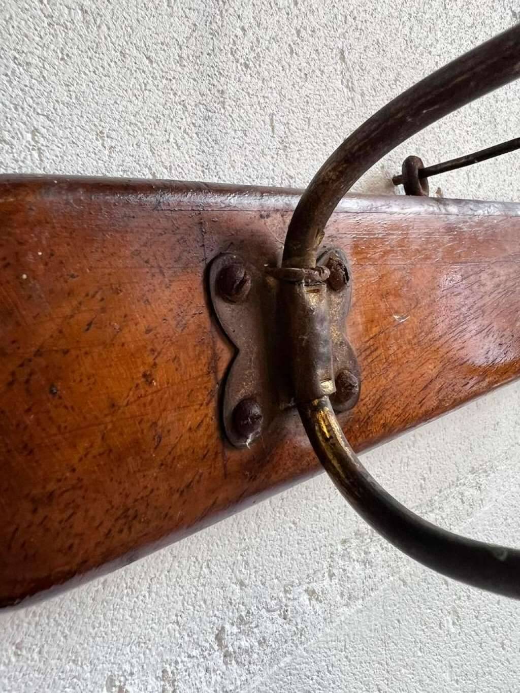 Vintage industrial wooden coat rack with porcelain hooks
