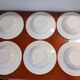 Set of 6 white ceramic deep plates made in Italy.