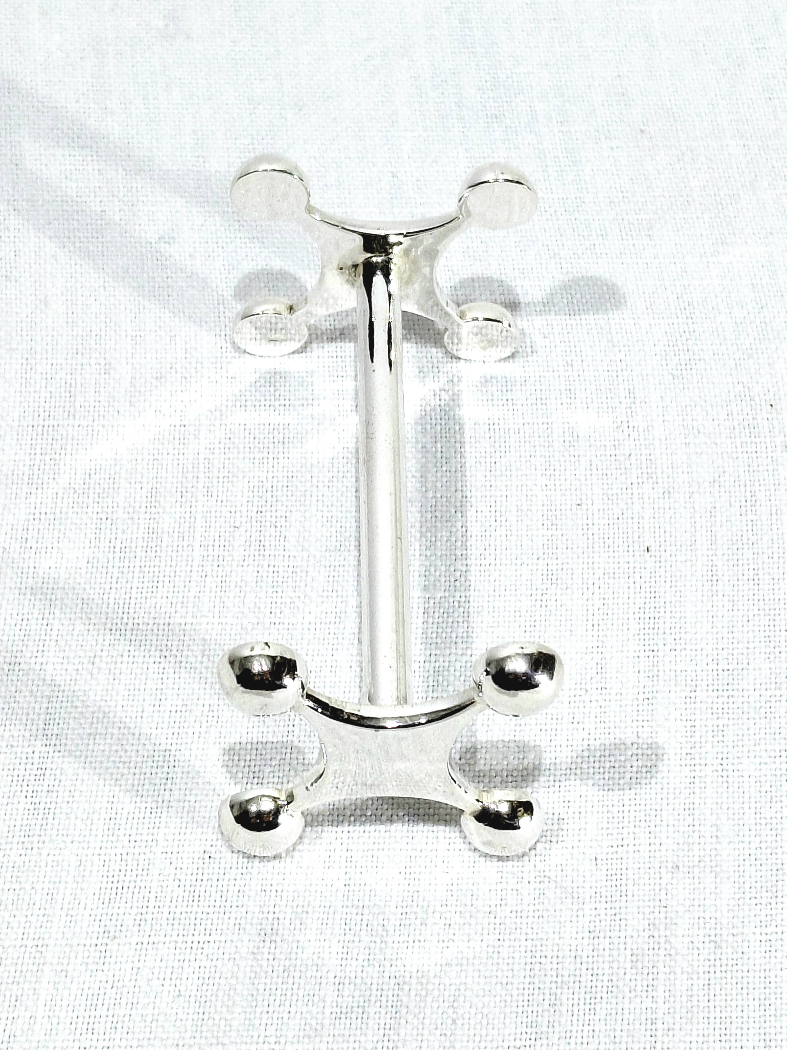 SET OF 12 SILVER-PLATED KNIFE RESTS