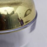 Glass and brass apple sweetener