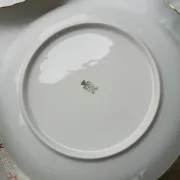 vintage porcelain dinner service with fish pattern and gold trim