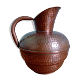 Dented copper vase or jug