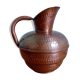 Dented copper vase or jug