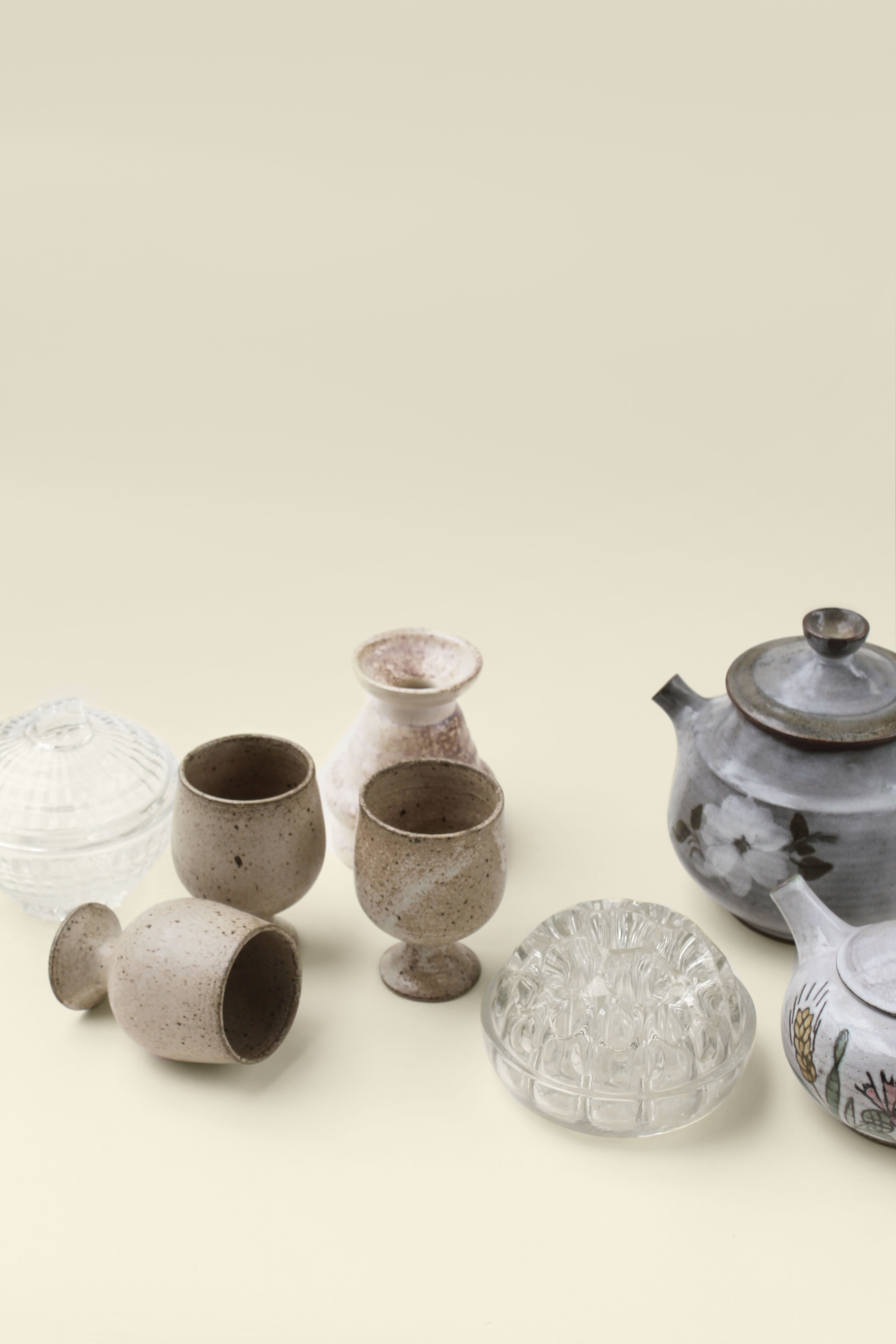 Sandstone teapot with floral pattern