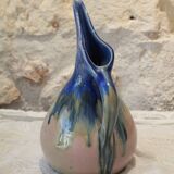 Vase, or pitcher, in enamelled stoneware with a bird's head, circa 1920