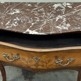 Curved and inlaid Louis XV style chest of drawers
