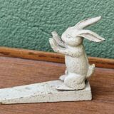 Old cast iron rabbit door wedge