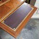 Louis XV bonheur du jour in rosewood marquetry decorated with bronze.