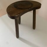 Antique tripod farm stool in brutalist style