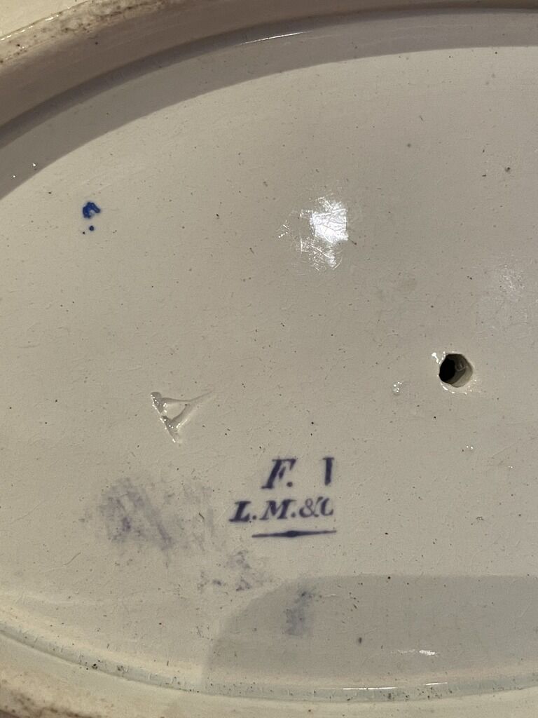 Large porcelain sauciere with blue and white decoration of the 19th century