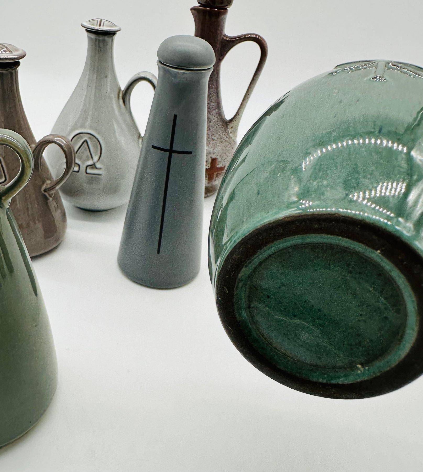 Set of nine modern sculptural ceramic vases from the mid-century, Bauhaus influence.