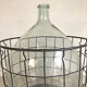 Demijohn and its metal basket