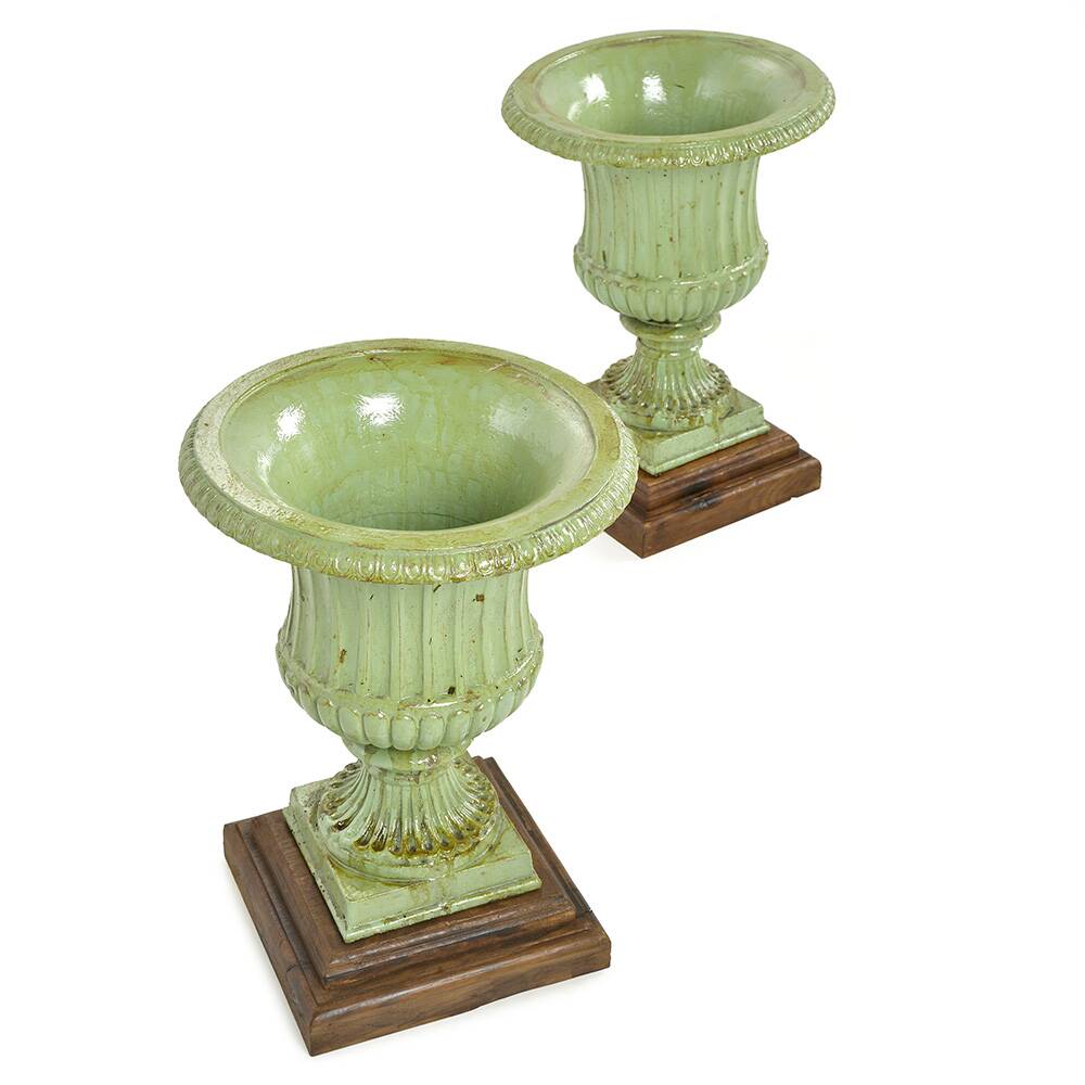 Pair of Medici cast iron vases with green patina