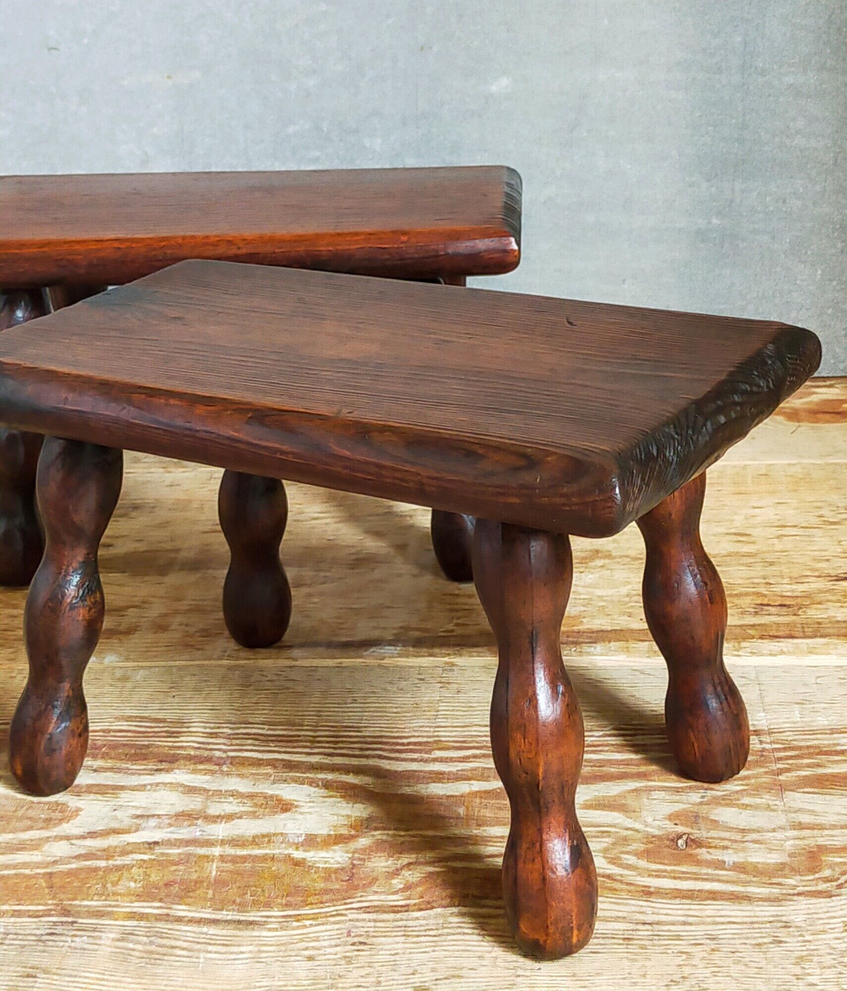 Pair of vintage solid turned wood footstools