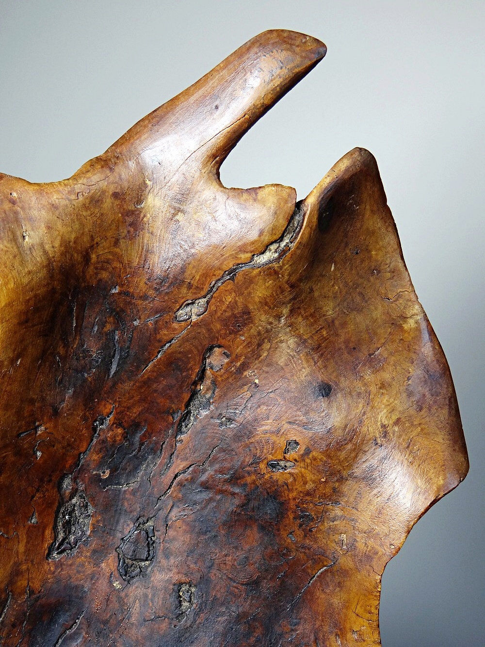 Large monoxyle bowl made of dark raw olive wood from the 1950s.