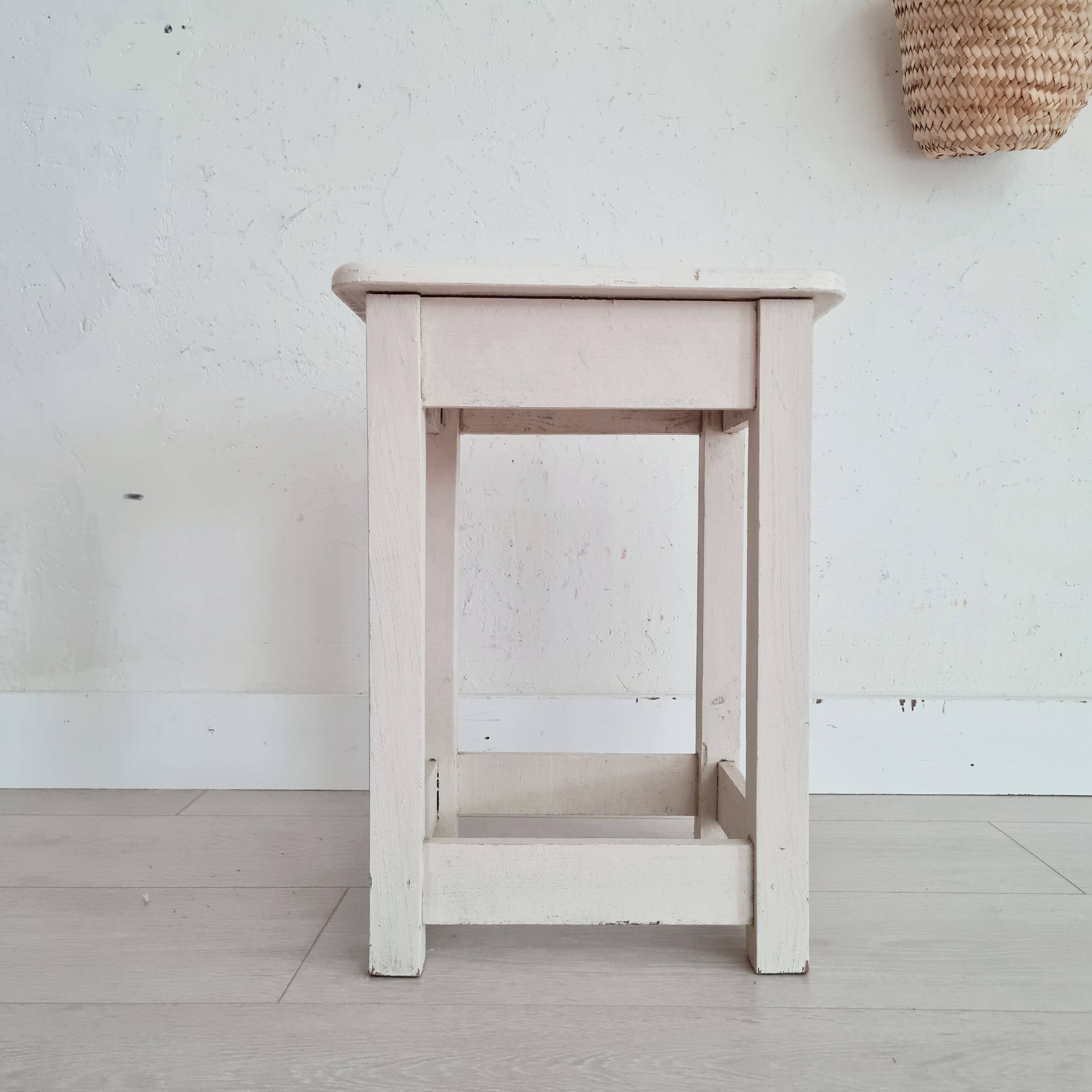 Old stool with white patina