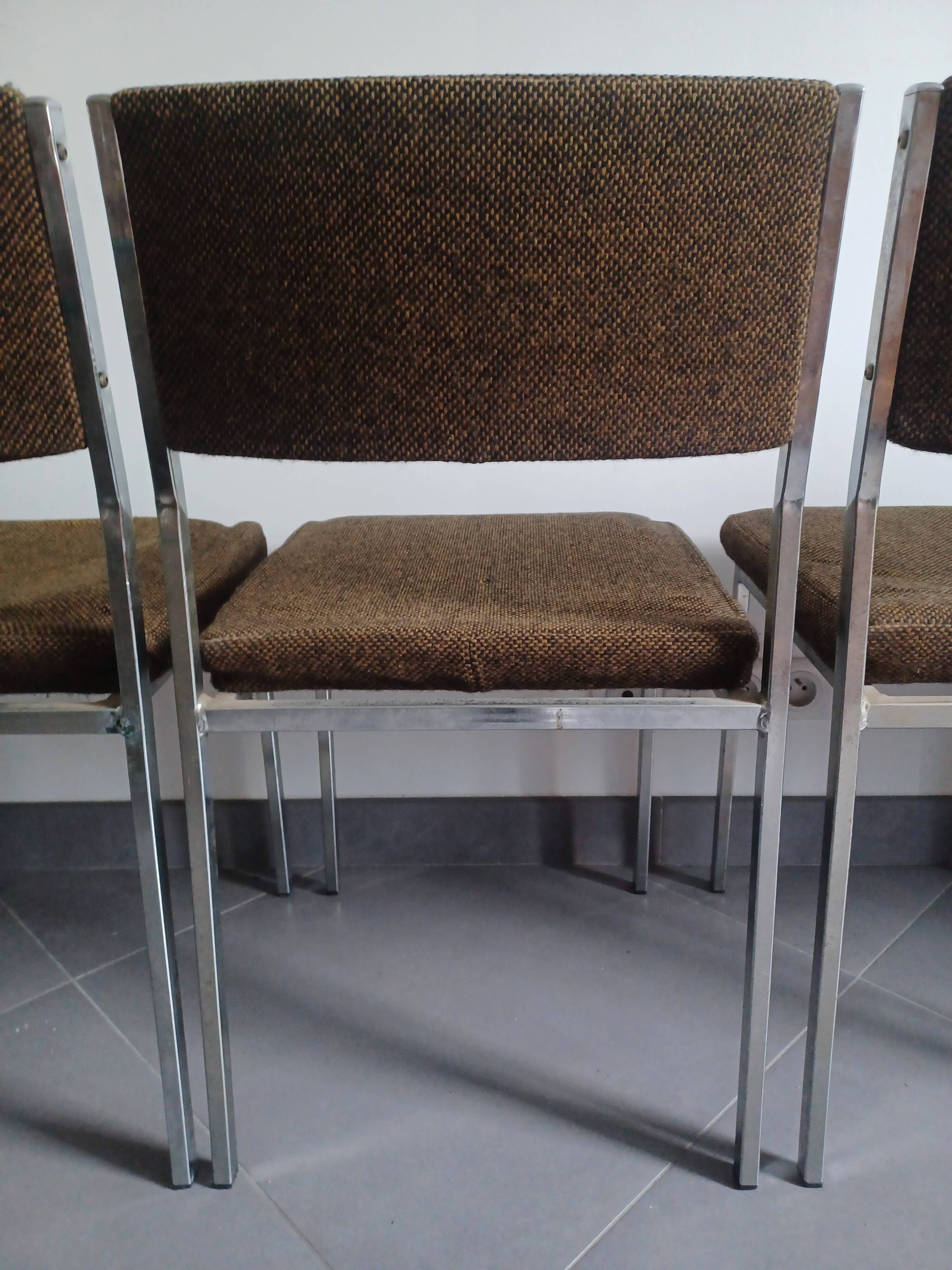 Five chairs in chromed metal and mottled fabric