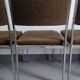 Cinq chaises en métal chromé et tissu chiné