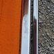 Pair of designer armchairs in orange fabrics and chrome tubes from the 70s