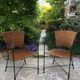 Paire de fauteuils vintage en fer forgé et osier