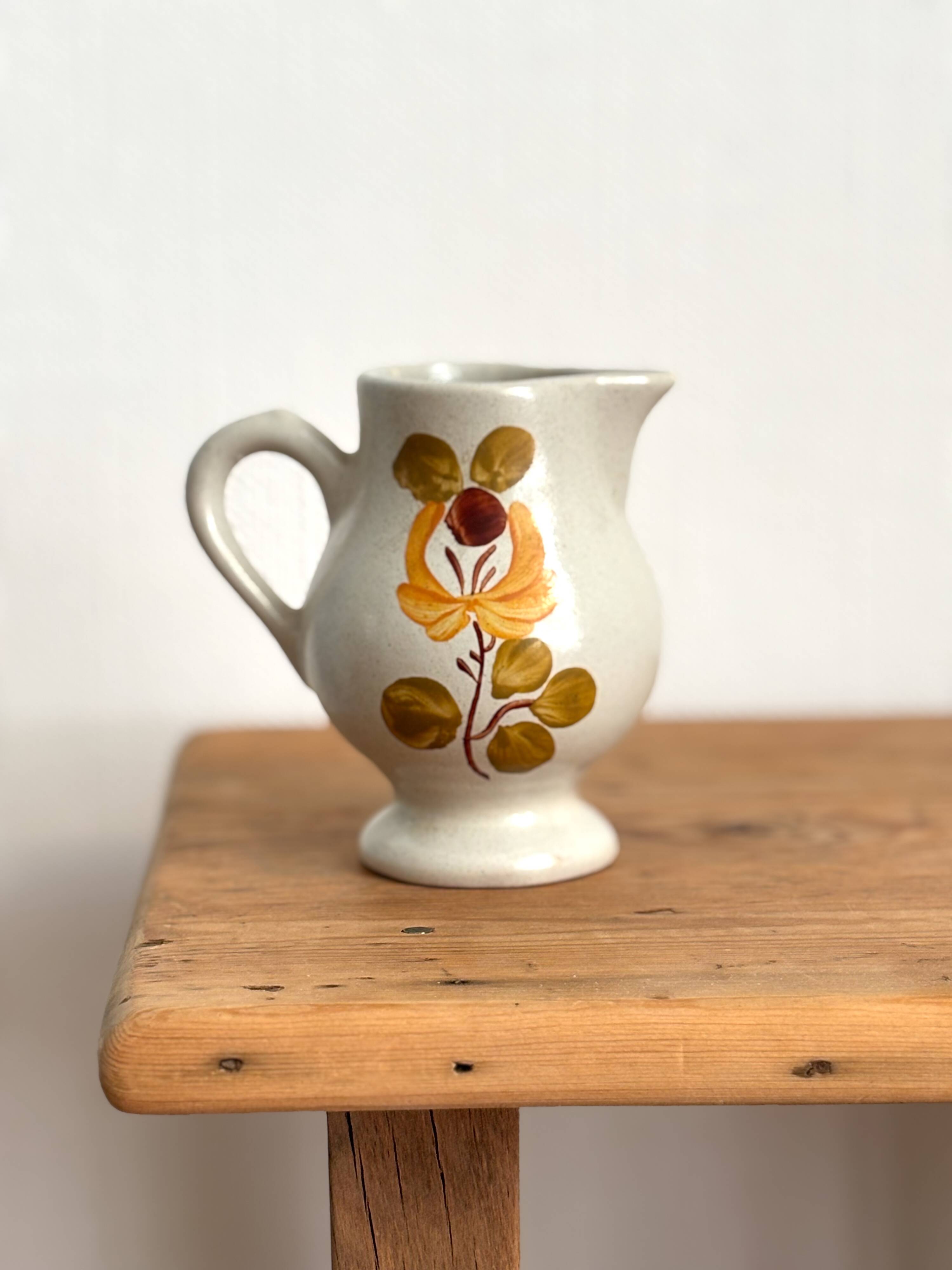 Vintage Maine St Amand earthenware pitcher with floral decorations