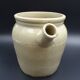 Grease pot with burgundy sandstone spout