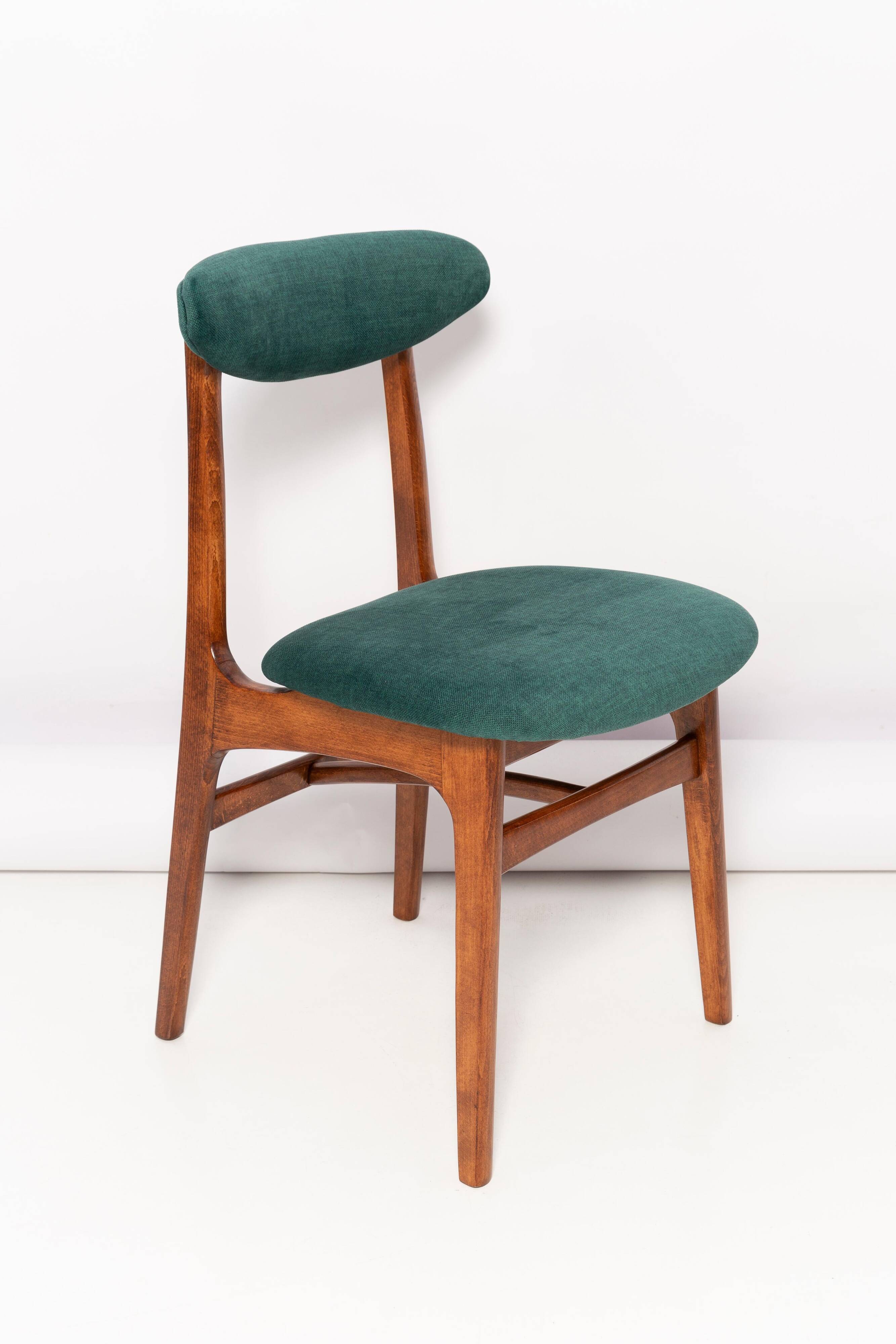 Green velvet Mid-Century chair designed by Rajmund Hałas, Poland, 1960s.