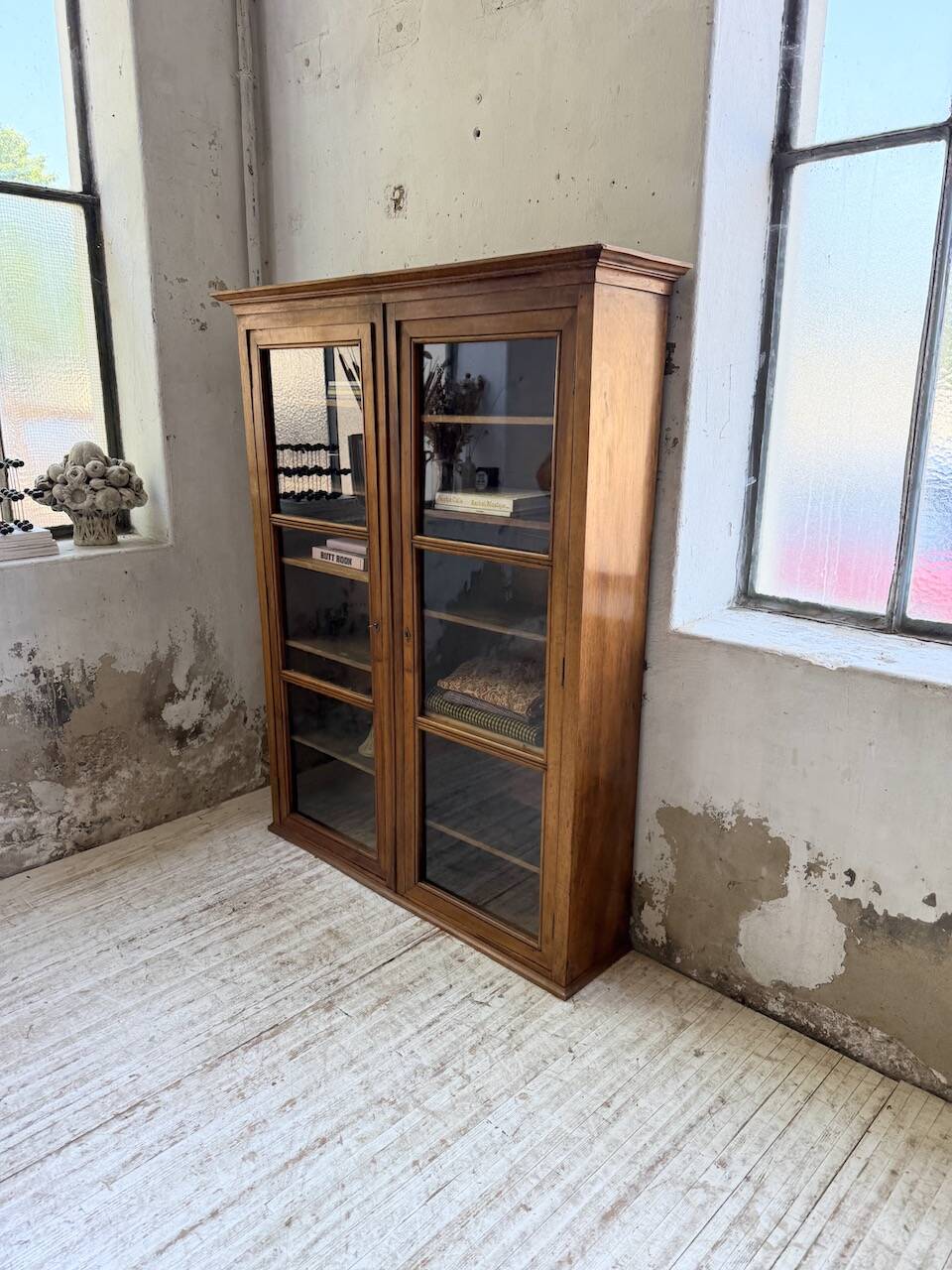 Glass-fronted walnut library 1900