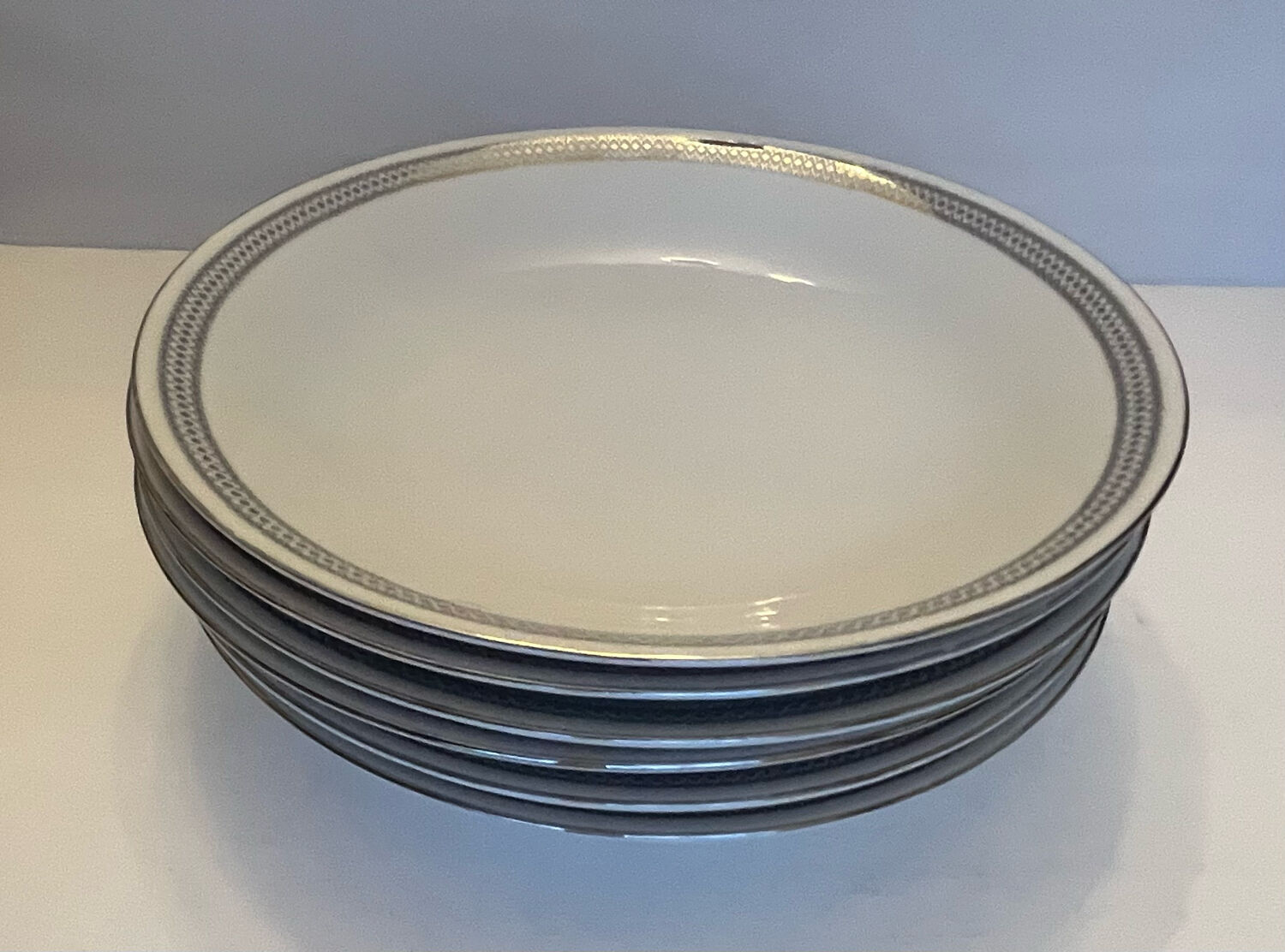 6 hollow white porcelain plates